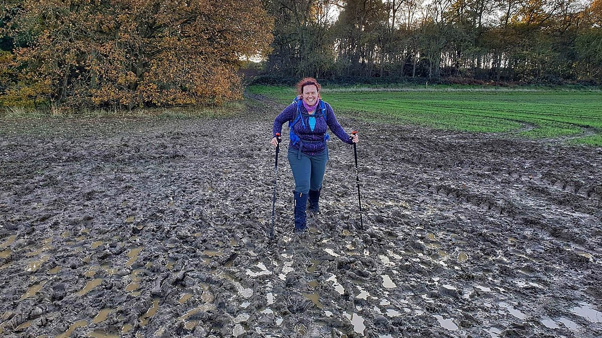 A walker negotiates a muddy path in Stamford, Lincolnshire. Photo: Ramblers