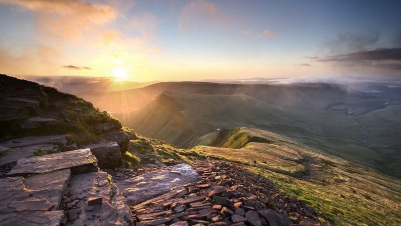 Image Source: Getty Images. Bannau Brycheiniog, or the Brecon Beacons National Park, covers 520 square miles on the border of mid and south Wales