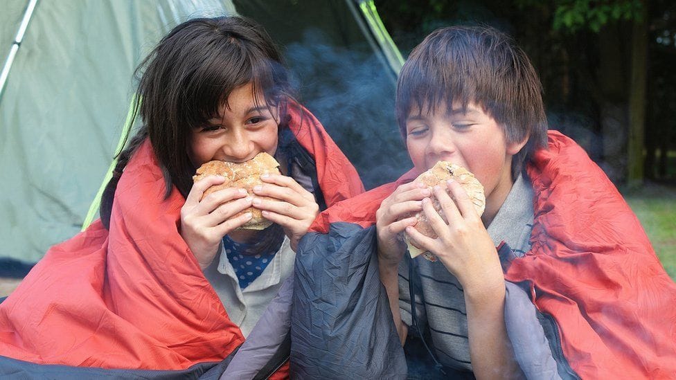 Image from the original article "UK economy grows on camping and dining out" (description needed)
