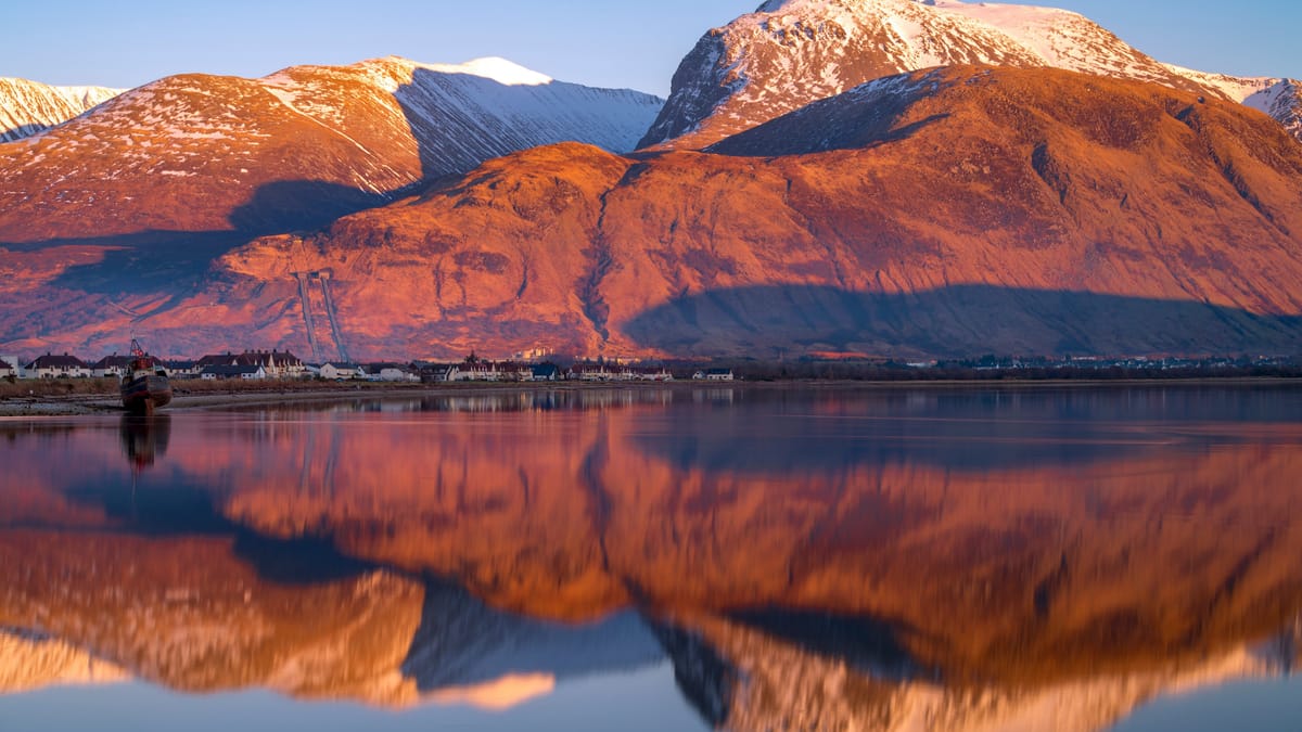 Last light on the famous Ben Nevis mountain with Loch Eilch. Taken from Corpach looking towards Inverlochy and Lochybridge with Fort William just to the right. Scottish Highlands. Image Source: Countryfile