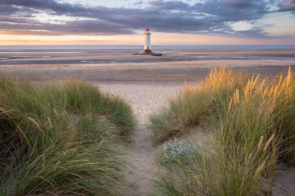 The Point of Ayr Lighthouse, a Grade II listed building situated near the village of Talacre