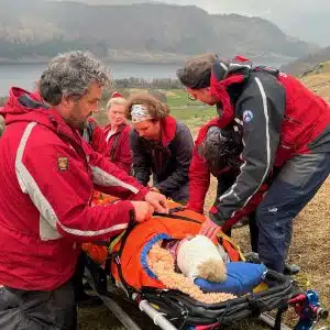 Injured woman on stretcher