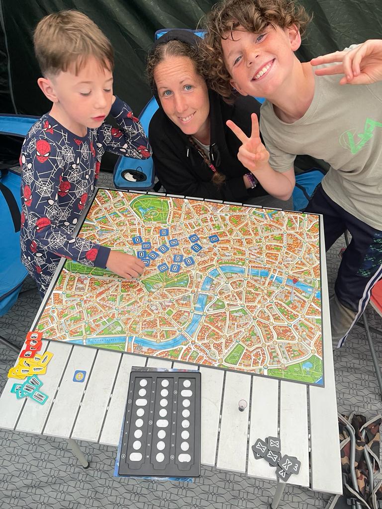 Louise, Carter, Corey and Andy playing Scotland Yard when it was raining